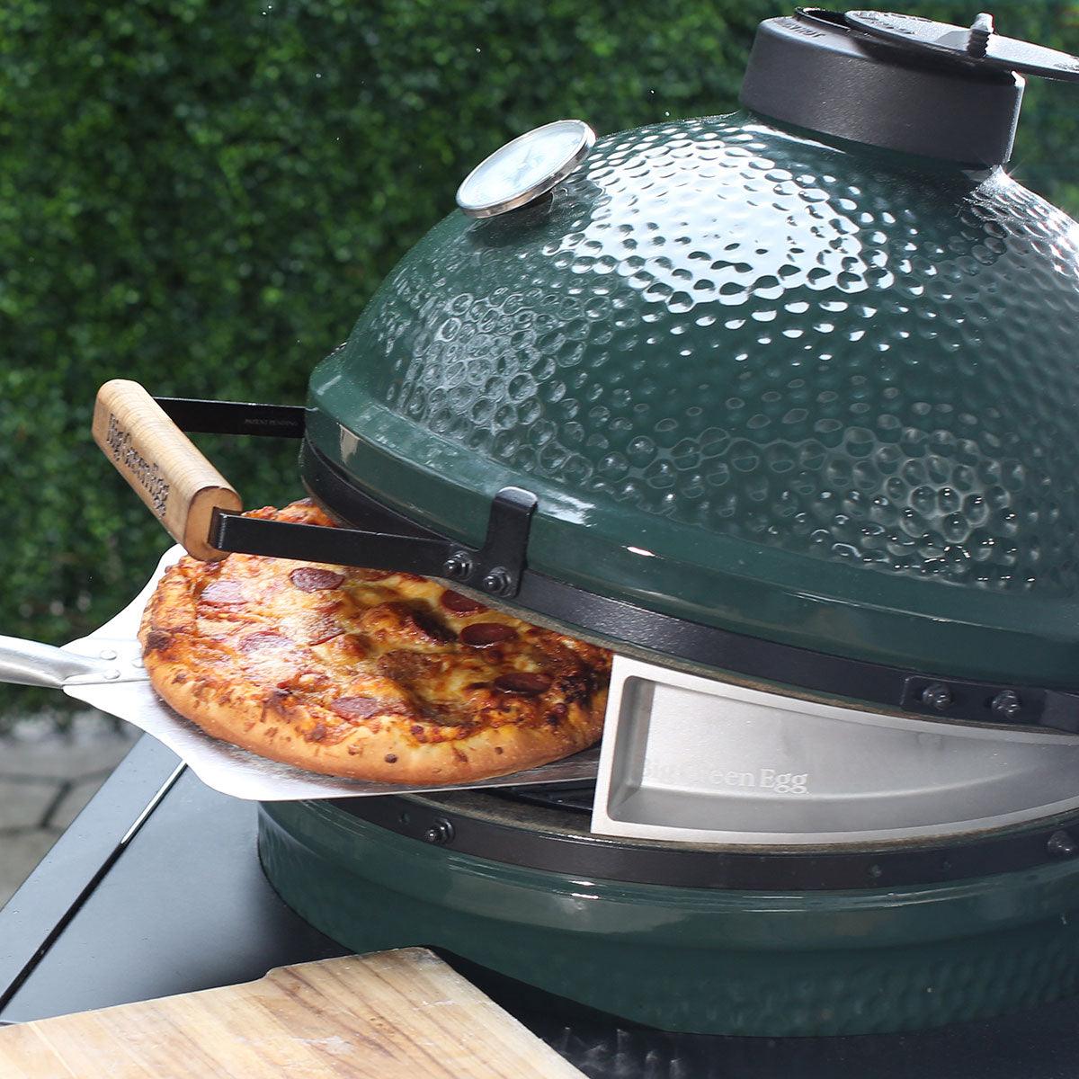 https://indigopoolpatiobbq.com/cdn/shop/products/big-green-egg-pizza-wedge-2.jpg?v=1669739686&width=1445